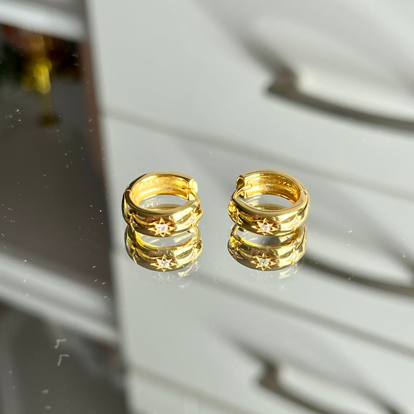 Huggie earrings, constellation jewellery, star-inspired jewellery, sparkly earrings